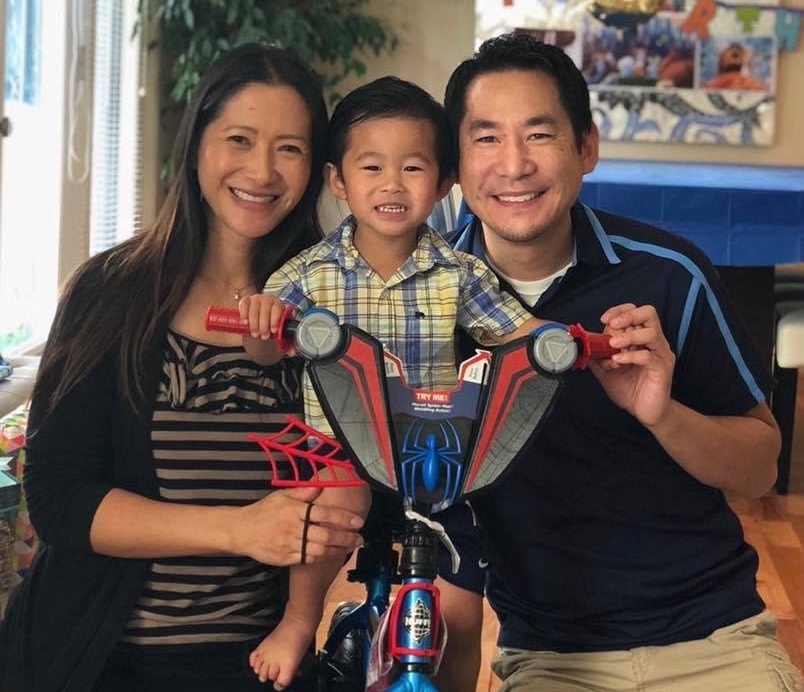 Jason with his wife and son